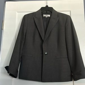 Jacket is a size 10 and pants are a size 6 Petite short.